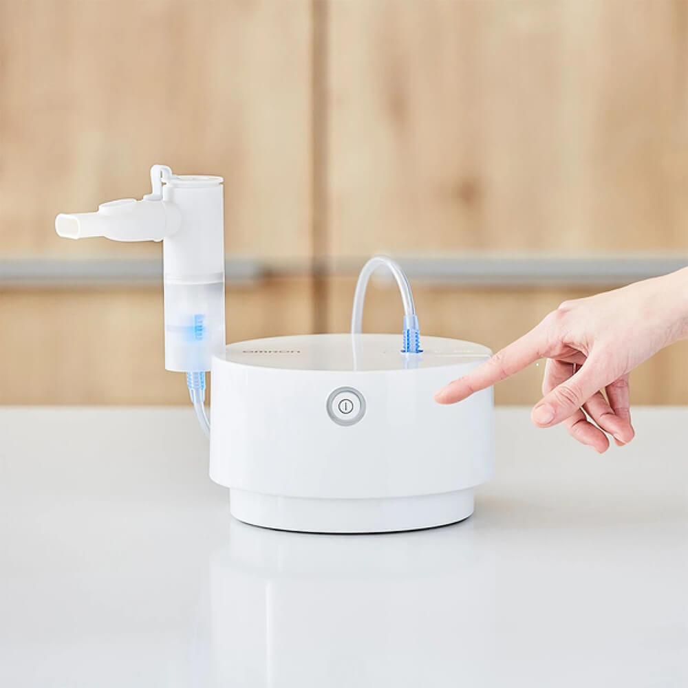 Home-use compressor nebulizer – OMRON C28P model with accessories